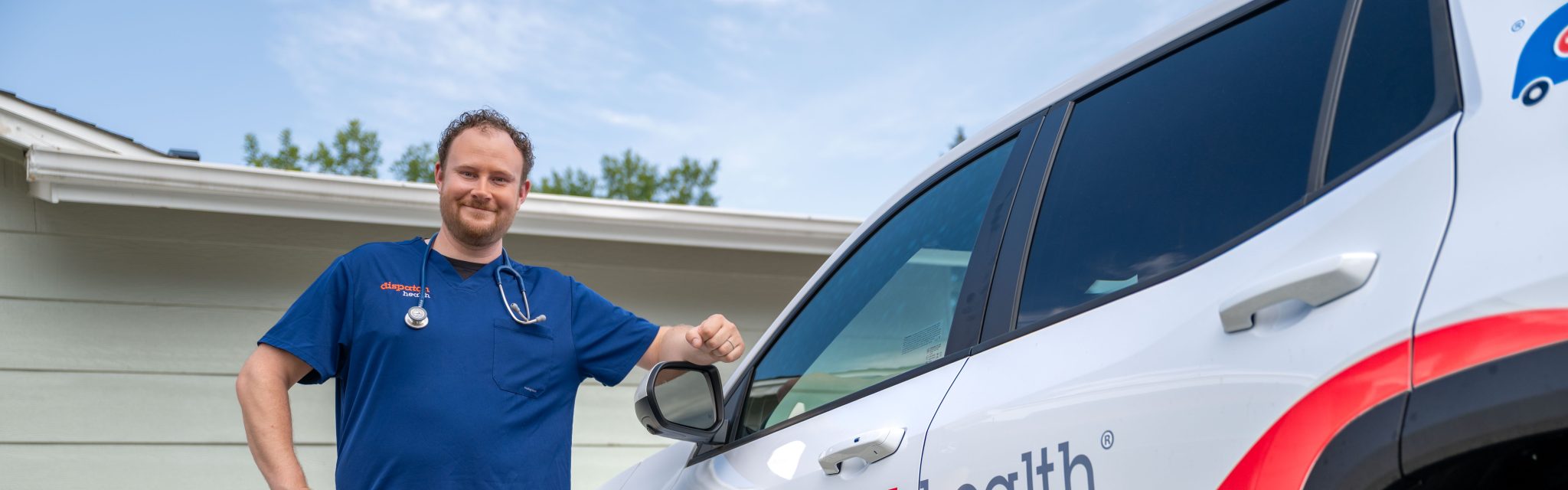 DispatchHealth medical team providing comprehensive care to elderly patient in home environment