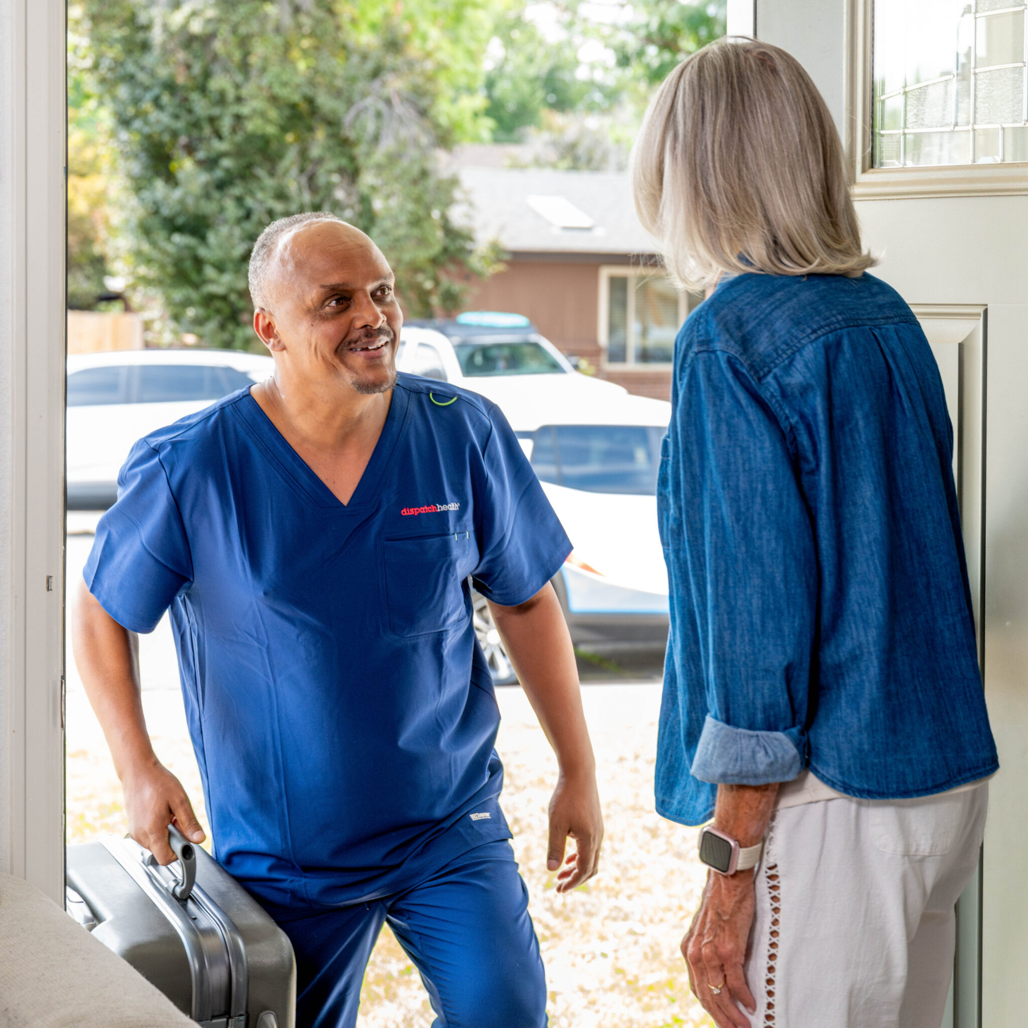 DispatchHealth worker arriving.